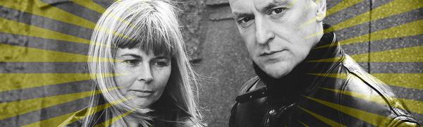 A man and woman pictured in black and white, overlaid with a swirling yellow graphic