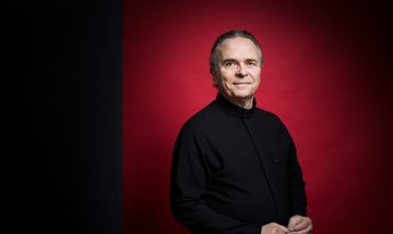 Man smiling and facing camera