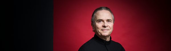 Man smiling and facing camera