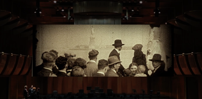 Vintage sepia toned photo of a group of people from the early 20th Century