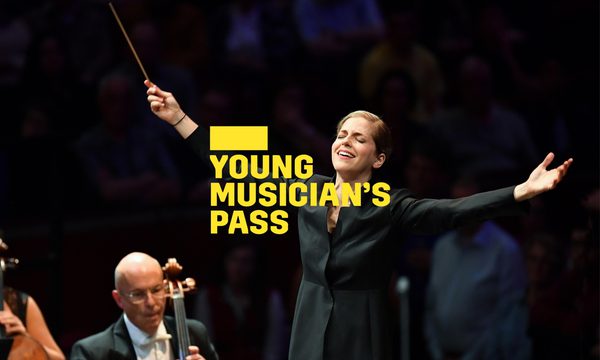 A yellow logo reading Young Musician's Pass overlays a conductor standing in front of the orchestra with her hands spread wide