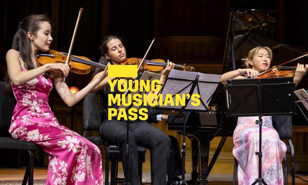 A yellow logo reading Young Musician's Pass overlays three women seated on stage playing string instruments