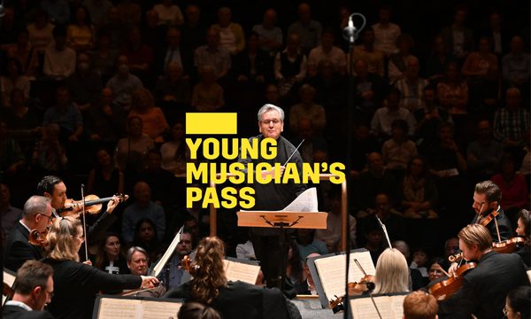 A yellow logo reading Young Musician's Pass overlays a conductor standing facing the orchestra with his baton across his chest