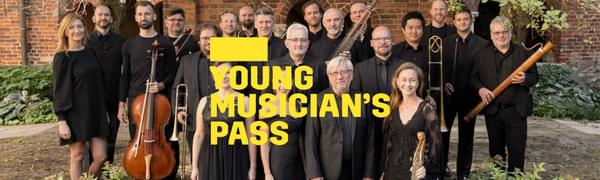 A yellow logo reading Young Musician's Pass overlays a group of musicians dressed in black standing in front of a brick building. Trees and bushes frame them.