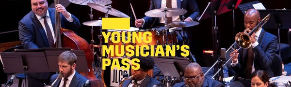 A yellow Young Musician's Pass logo in front of players from Jazz at Lincoln Center performing on stage