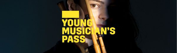 A yellow Young Musician's Pass logo in front of a woman mostly obscured by shadow holding a bagpipe instrument