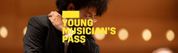 A yellow Young Musician's Pass logo in front of a conductor mid movement