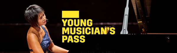 A yellow Young Musician's Pass logo in front of a woman wearing a blue dress playing a piano on stage