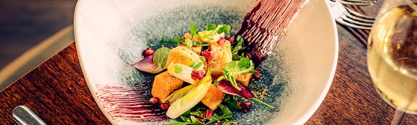 An image of a bowl of food sitting on a table