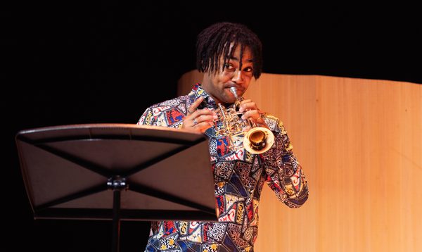 a man plays the trumpet