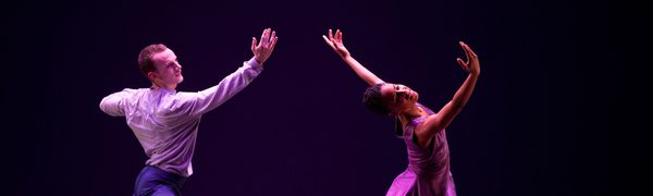 a man and a women contemporary dance together