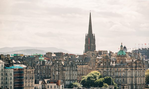 An Edinburgh skyline featuring the gothic spire of The Hub.