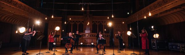 Members of the Scottish Symphony Orchestra perform in an airy room in the Hub, Edinburgh