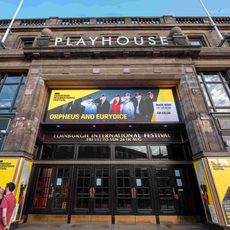 The Edinburgh Playhouse with advertisements for 'Orpheus and Eurydice' at the Edinburgh International Festival