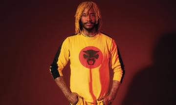 ThundeThundercat pictured wearing a yellow tracksuit